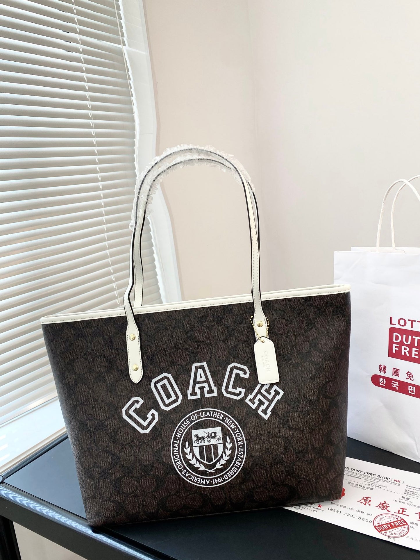 Co-BAG144