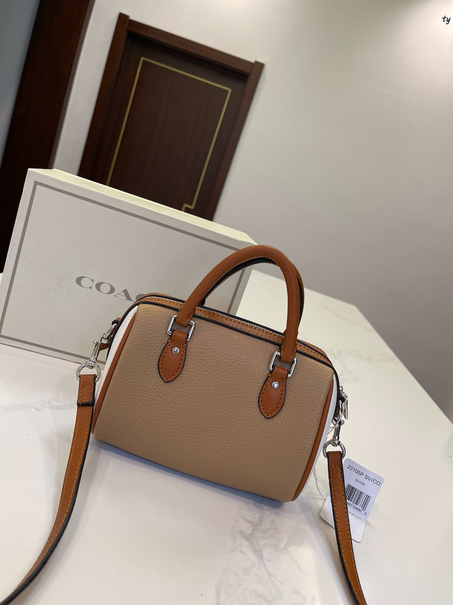 Co-BAG559