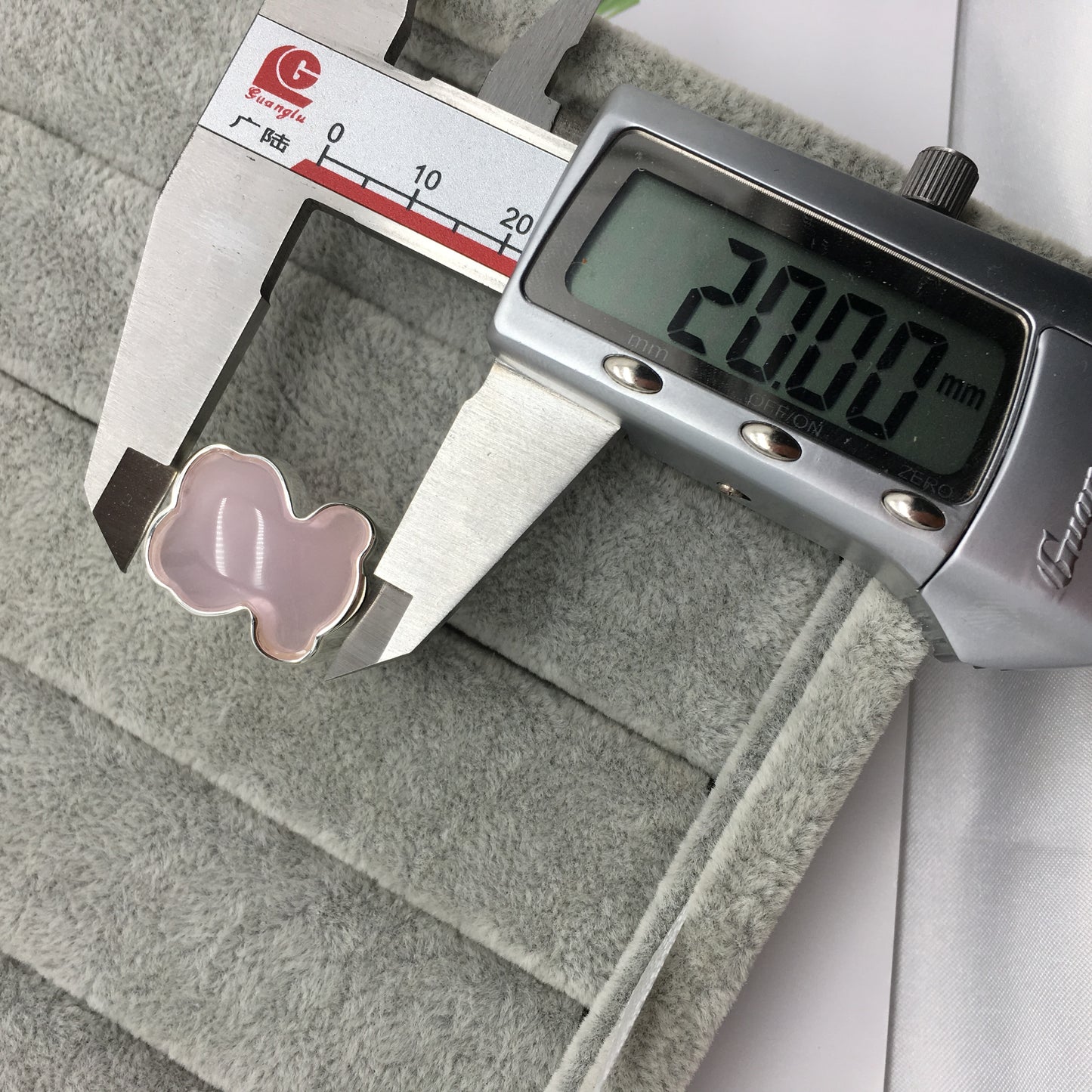 615435590